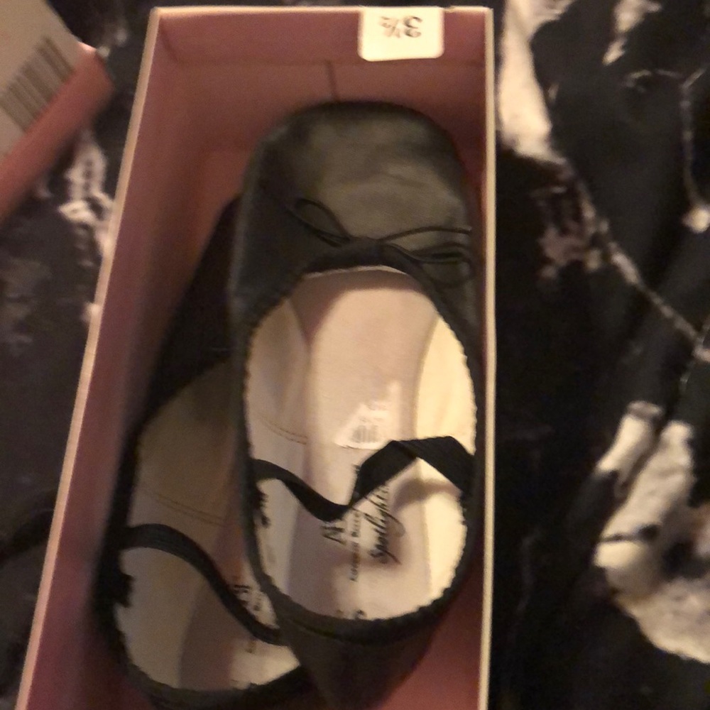 Black ballet slippers